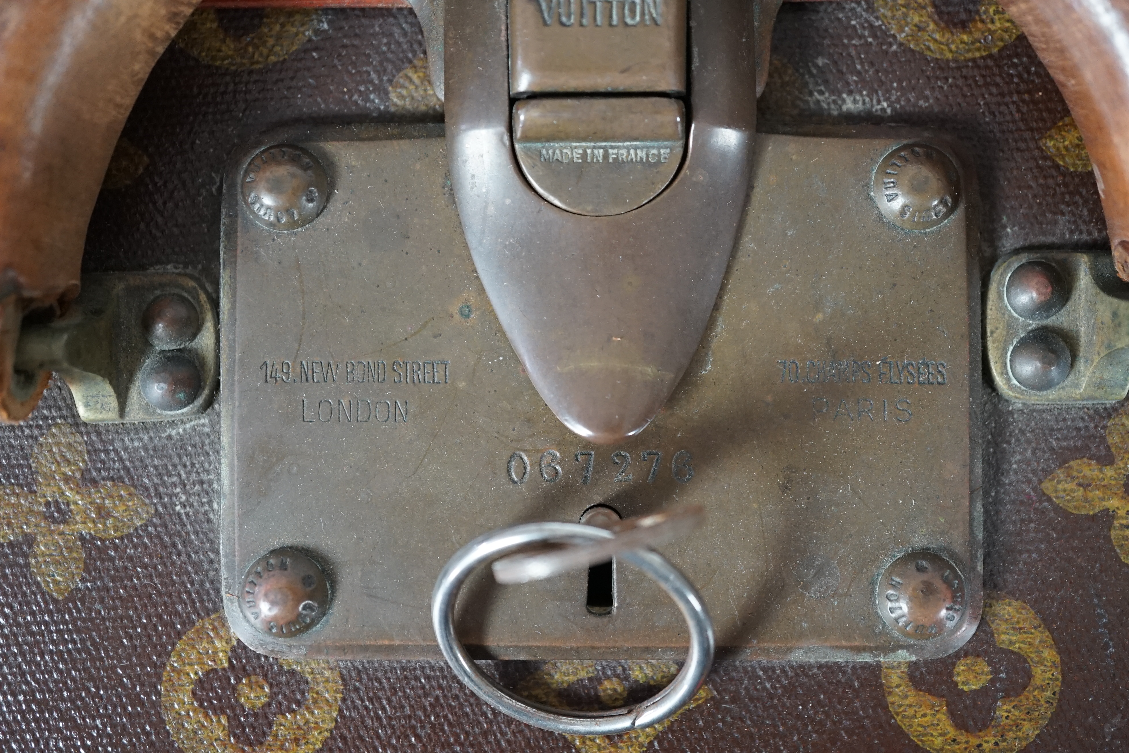 A vintage Louis Vuitton monogram canvas suitcase, 71cm x 44cm x 22cm